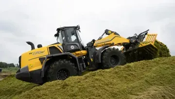 New Holland выпустил обновленный колесный погрузчик W170D с функцией Forage Power